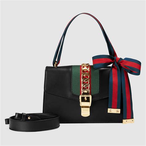 tratto distintivo sylvie gucci|gucci designer handbags.